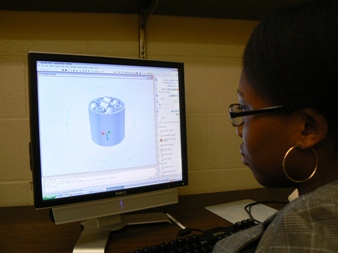 Winnie Nabea developing an AutoCAD model of a tube of Raschig rings
